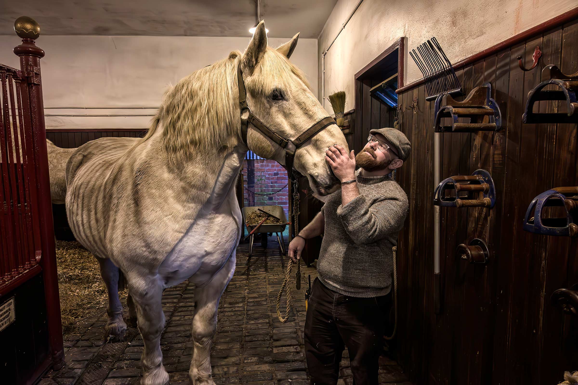 Rider with horse at Beamish Museum in the stables